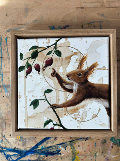 Das Eichhörnchen mit der Hagebutte